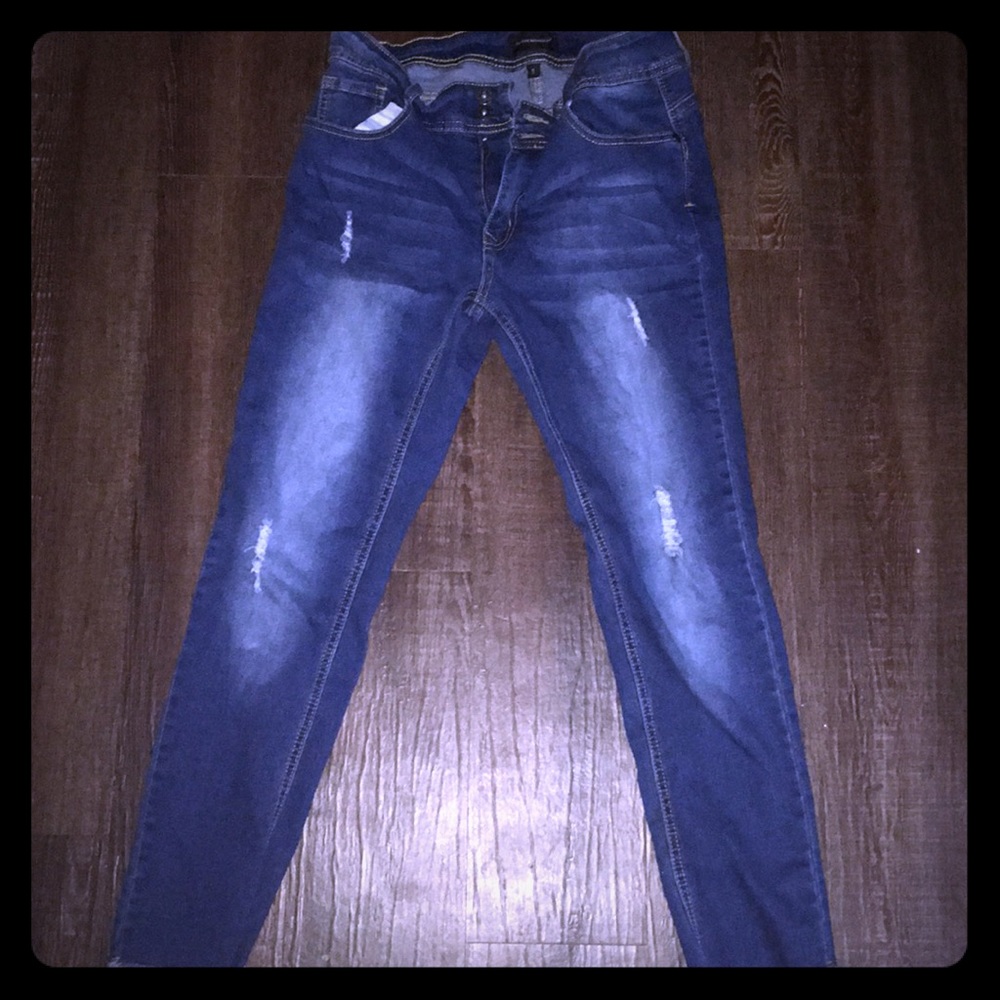 High rise blue jeans